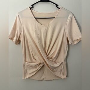 EUC Lululemon Peach Knot Front Short Sleeve PTP Measurement is 20”